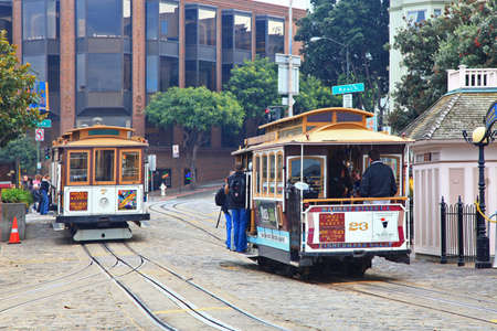 Antique Cable Car Powell Hyde Line on Hyde Street at Beach Street in downtown San Francisco, California CA, USA.のeditorial素材