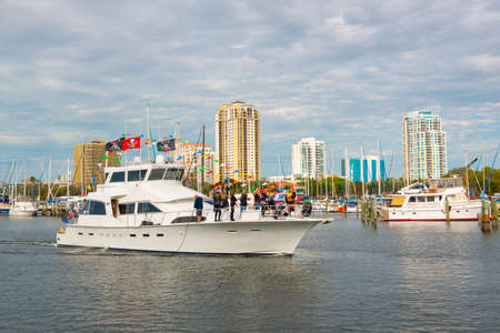 Yacht on Central Yacht Basin with Modern city skyline including Parkshore Plaza at the background, viewed from Demens Landing Park in downtown St. Petersburg, Florida FL, USA.のeditorial素材