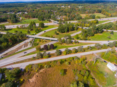 Interstate Highway 95 in Maine at Exit 2 with US Route 1 interchange aerial view in fall in town of...