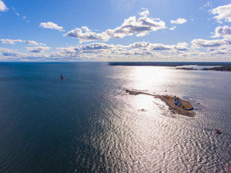 Aerial view of Whaleback Lighthouse on the left and Wood Island Life Saving Station on the right at...