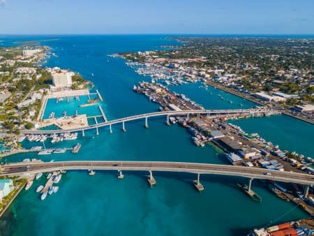 Nassau downtown aerial view including Paradise Island Bridge and Potters Cay in Nassau Harbour, New Providence Island, Bahamas.のeditorial素材