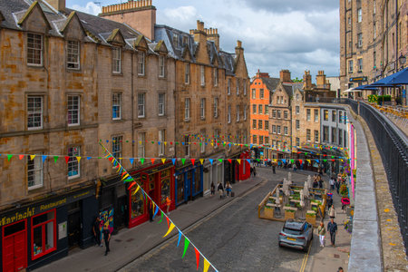 Historic commercial building on Victoria Street near Royal Mile in Old Town Edinburgh, Scotland, UK. Old town Edinburgh is a UNESCO World Heritage Site since 1995.のeditorial素材