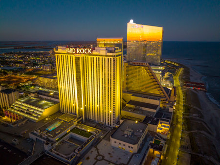 Hard Rock Hotel, Showboat and Ocean Casino Resort at Boardwalk at night in Atlantic City, New Jersey NJ, USA.のeditorial素材