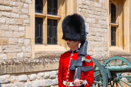 King's Life Guard in infantry uniform in front of Waterloo Block in Tower of London, London, England, UK. Tower of London is a UNESCO World Heritage Site since 1988.のeditorial素材
