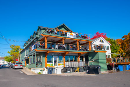 Marker 21 restaurant in fall at Lake Winnipesaukee waterfront in historic town center of Wolfeboro, New Hampshire NH, USA.のeditorial素材