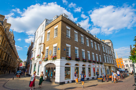 Historic commercial buildings on St. Mary's Street at Trinity Street next to Cambridge University in Central Cambridge, England, UK.のeditorial素材