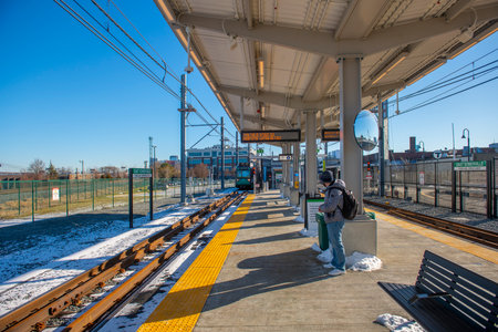 MBTA Green Line Kinki Sharyo Type 7 train at East Somerville station in Somerville, Massachusetts MA, USA. Green Line Extension opened on Dec. 12, 2022.のeditorial素材