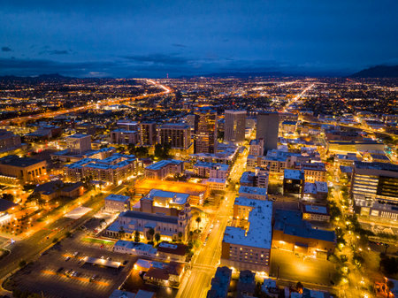 St. Augustine Cathedral and Tucson skyscrapers at sunset including One South Church, Bank of America Plaza and Pima County Legal Services Building in downtown Tucson, Arizona AZ, Uの写真素材