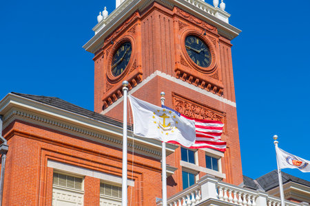 Flag of Rhode Island State in front of Warwick City Hall at 3275 Post Road in village of Apponaug, city of Warwick, Rhode Island RI, USA.のeditorial素材