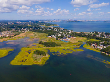 Town River Bay aerial view next to Quincy Bay with Boston modern skyline at the background in city of Quincy, Massachusetts MA, USA.の写真素材