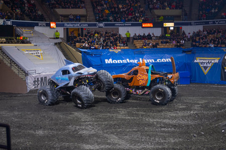 Megalodon and Scooby Doo in Monster Jam competition in DCU Center in Worcester, Massachusetts MA, USA.のeditorial素材