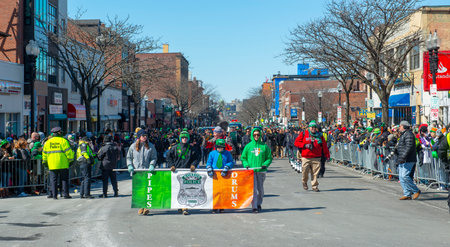 Boston Pipers and Drums band with Highland kilt dress on 2018 Saint Patrick's Day Parade in Boston, Massachusetts MA, USA.のeditorial素材