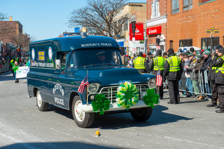 Antique Boston Police Car in Saint Patrick's Day Parade in Boston, Massachusetts MA, USA.のeditorial素材