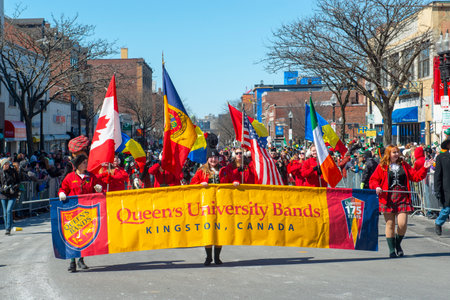 Queen's University Bands March on 2018 Saint Patrick's Day Parade in Boston, Massachusetts MA, USA.のeditorial素材