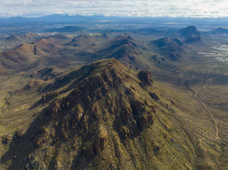 Bren peak and Ringtail Ridge in Tucson Mountains aerial view with Sonoran Desert landscape from Gates Pass near Saguaro National Park in city of Tucson, Arizona AZ, USA.の写真素材