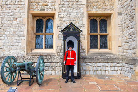 King's Life Guard in infantry uniform in front of Waterloo Block in Tower of London, London, England, UK. Tower of London is a UNESCO World Heritage Site since 1988.のeditorial素材