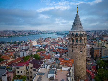 Galata Tower aerial view with morning twilight with Golden Horn at back in Beyoglu in historic city of Istanbul, Turkey.の写真素材