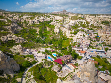 Goreme Town Center historic building with fairy chimney landscape near Goreme National Park in Cappadocia, Anatolia, Nevsehir Province, Turkey.の写真素材