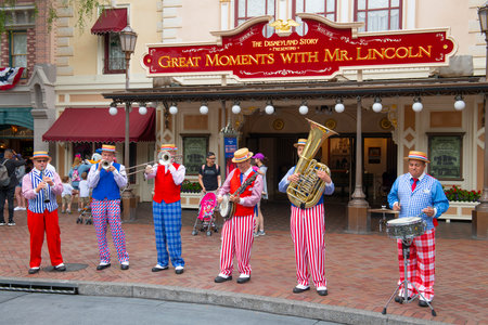 Band performing in front of Disneyland Railroad Station at Disneyland Park in Anaheim, California CA, USA.のeditorial素材