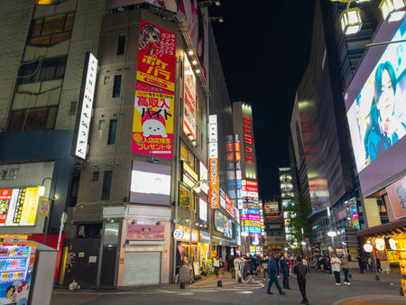 Shops and restaurants at night on Kabukicho Ichiban Gai Street in Shinjuku, Tokyo, Japan.のeditorial素材