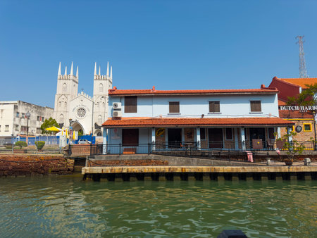 Church of St. Francis Xavier Melaka and waterfront house on Malacca River in city center of Melaka, Malaysia. Historic cities of the Strait of Malacca is a World Heritage Site.のeditorial素材