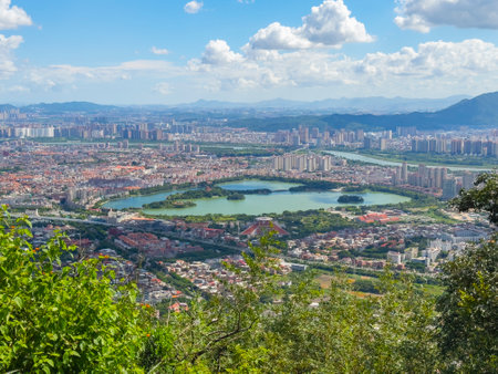 Quanzhou city aerial view including historic Licheng district and Xihu (West Lake) Park, from top of Mount Qingyuan, Quanzhou, Fujian Province, China.の写真素材