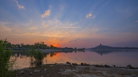 The sunrise of Wenchang Lakeの写真素材