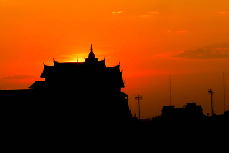 Thailand Temple silhouette on Sunrise Background.の写真素材
