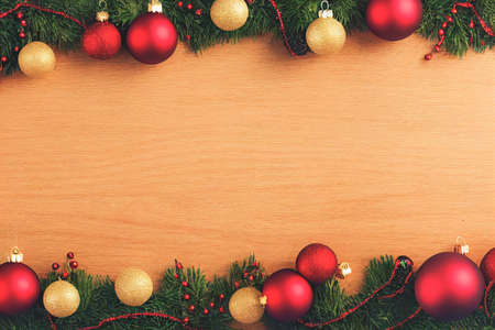 Christmas background with decorations on wooden background. Top view. Copy space. Merry Christmas celebration. Digital art 3D Render.の写真素材