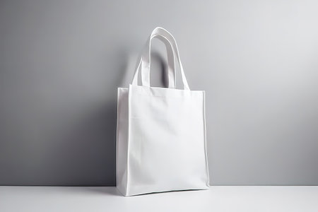 Blank canvas tote bag mockup in white eco friendly design with copy space. Concepts for zero waste movement of shopping bags.の写真素材