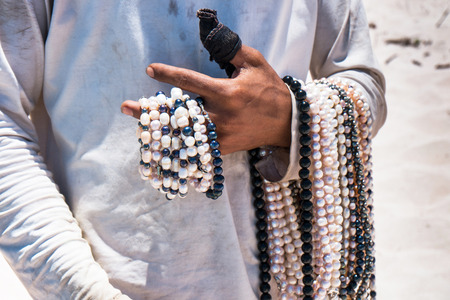 vendor necklaces of pearls, Indonesiaの写真素材