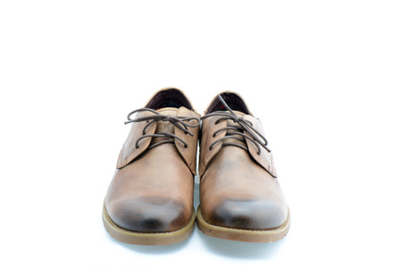Leather brown shoes isolated on white background の写真素材