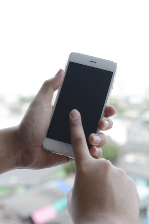 Man Touching Smart Phone.の写真素材