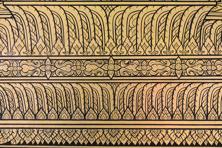 Thai style painting art on wall at the temple, Thailandのeditorial素材