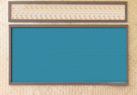 Blank chalkboard, Blackboard texture with copy space on the bamboo handicraft wall.の写真素材