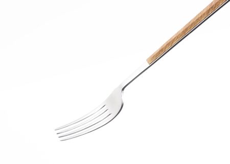 Wooden silver fork isolated on white background.の写真素材