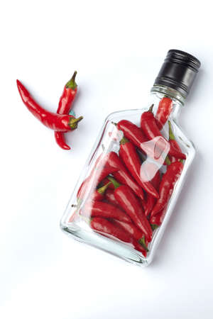 Red hot chili pepper on white background.
