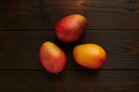 Mango Fruit on wooden background, Citrus Fruit, Food, Fruit, Sweet Foodの写真素材