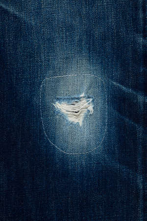 Blue rough jeans texture background.