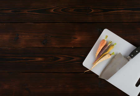 Color carrot with leaves at organic shop.の写真素材