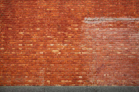 Brick wall with broken and old bricks texture.