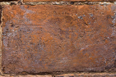 Old and weathered yellow wall. Stone pattern backgrounds.