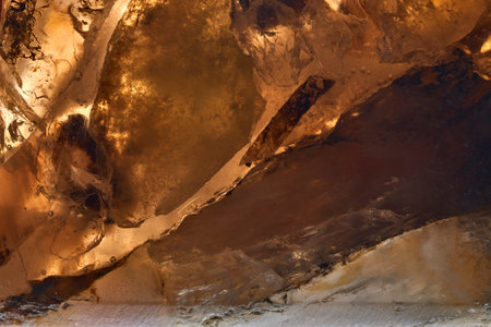 Close up shot of yellow Mineral Crystal photo, background, texture.
