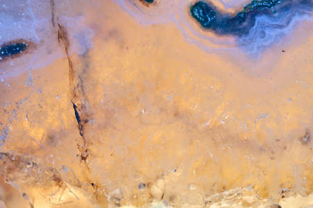 Macro photography of marble material as background.Yellow.