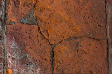 Old and weathered red wall. Stone pattern backgrounds.