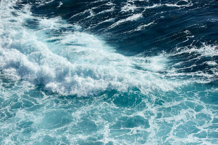 Sea floor stock photo. Smooth Pacific Ocean with blue color.