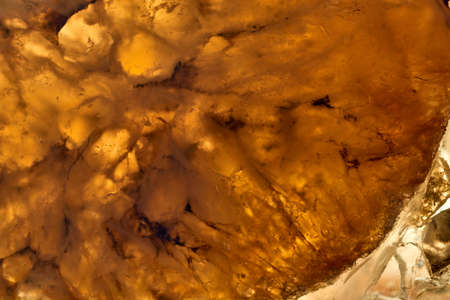 Shiny and glittering yellow crystal photo, Close-up shot.