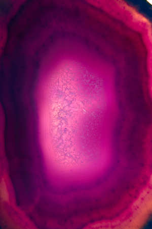 A banded Agate stone sample with crystals texture.