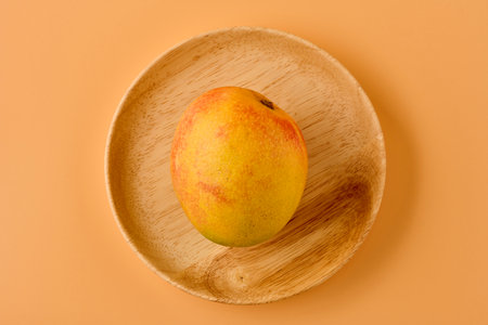 Mango fruits with yellow background.の写真素材