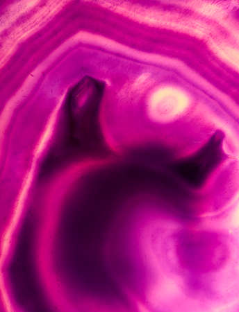Luxury raw red Agate Crystal surface texture as a background. Natural pattern surface, Abstract...
